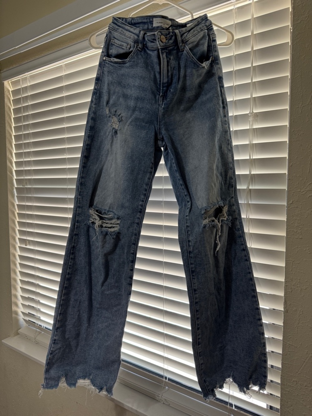 High-Rise Distressed Wide-Leg Jeans in Washed Navy